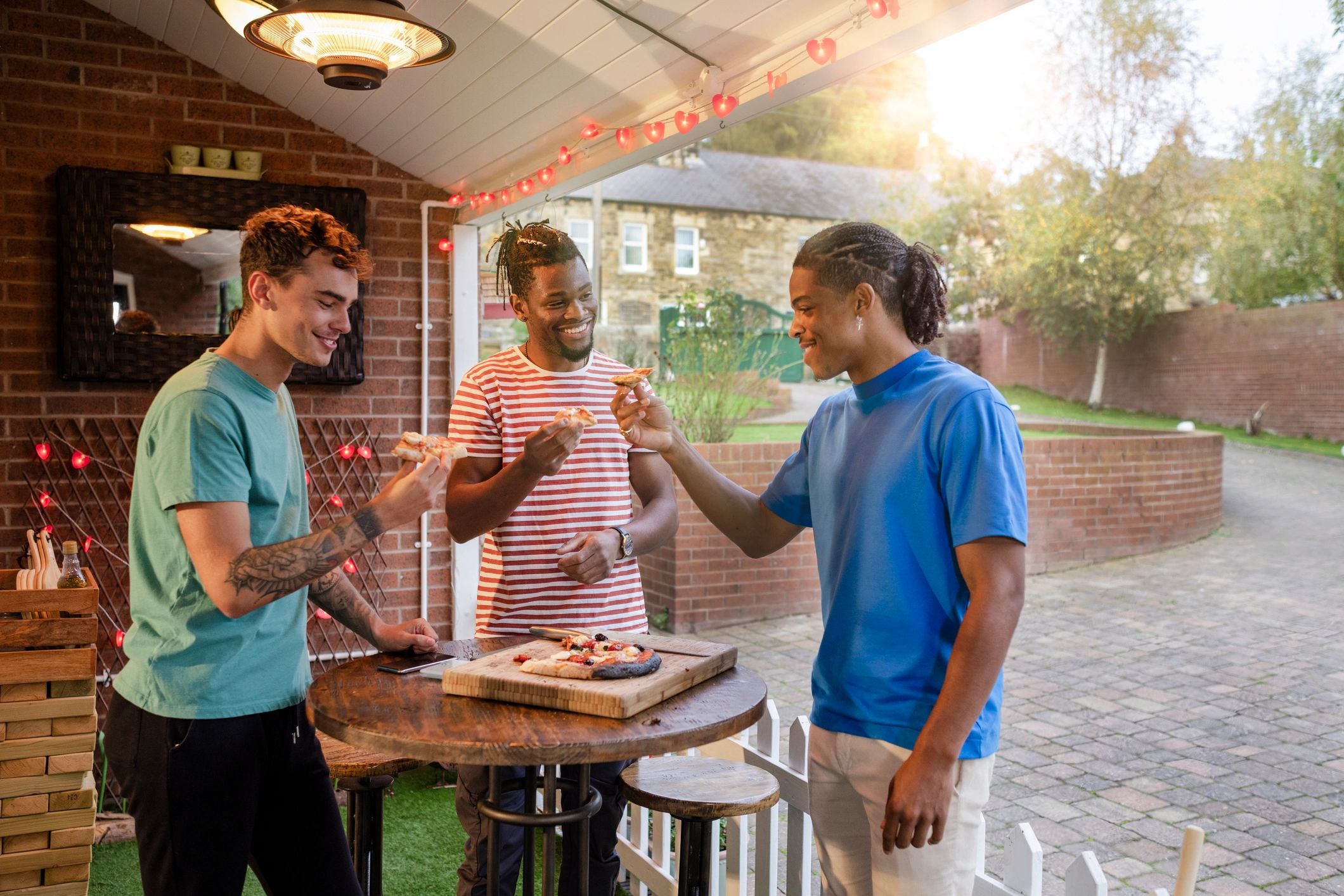 Friends enjoying freshly cooked food outdoors