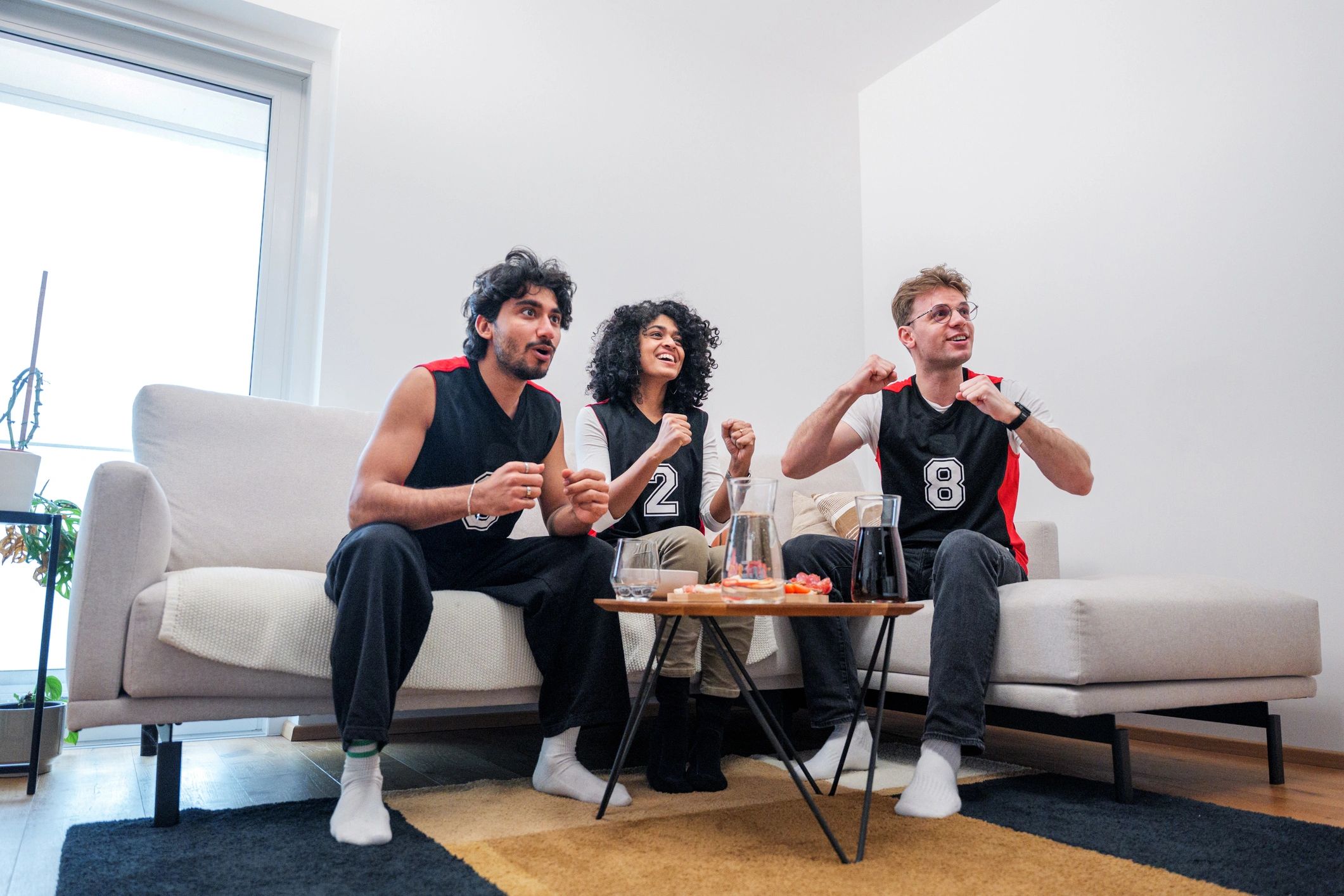 Friends enjoying a game-day watch party