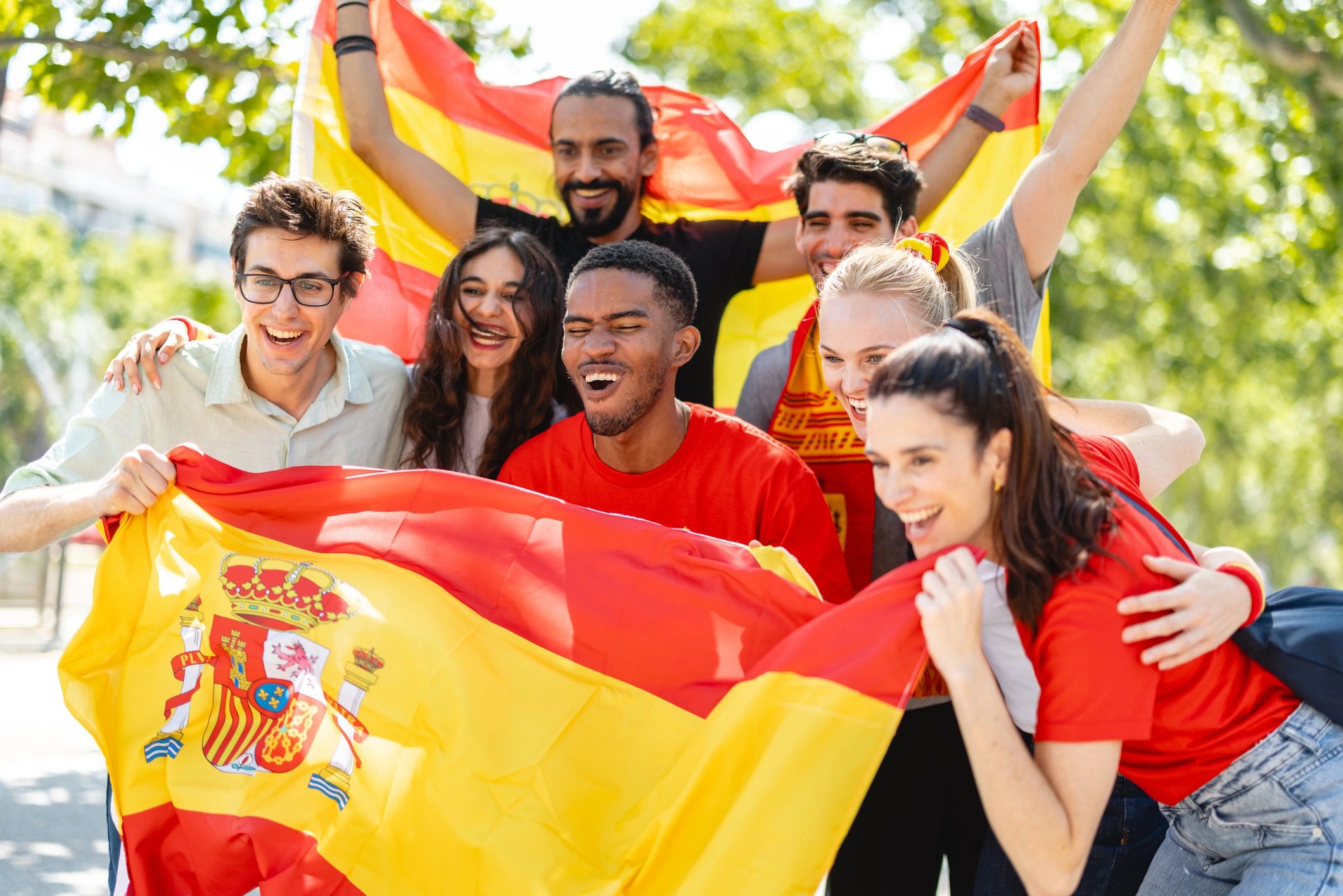 Football fans celebrating outdoors on game day